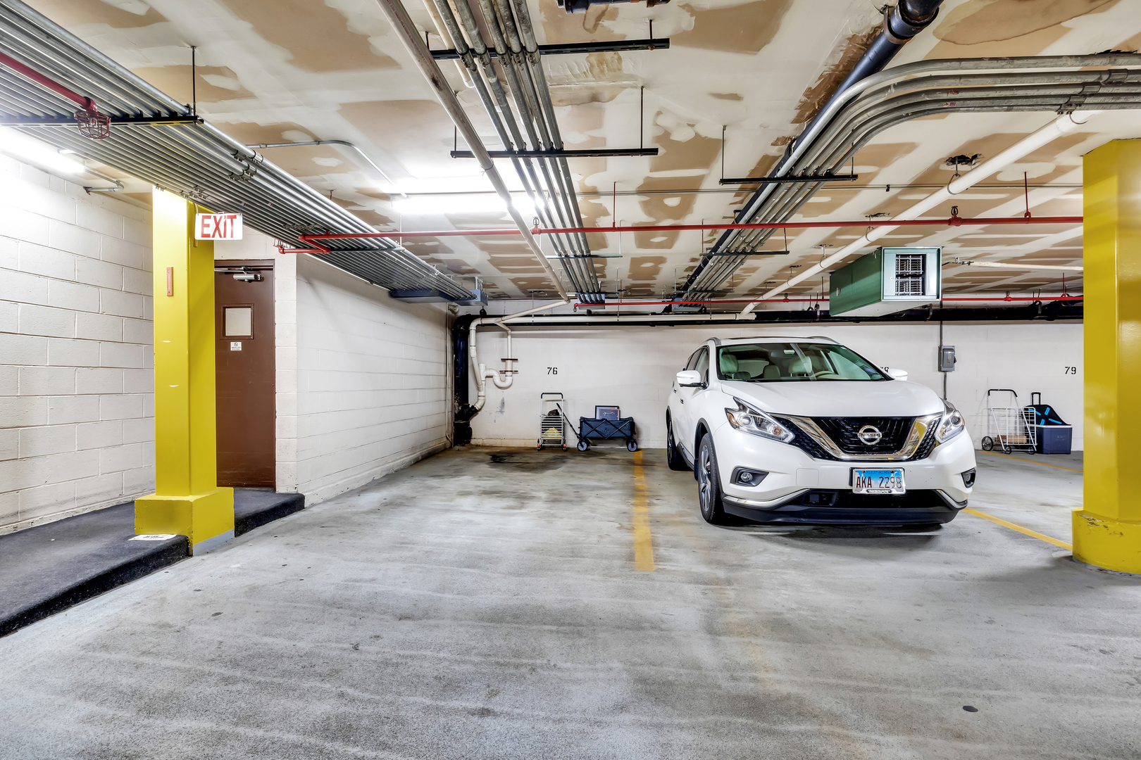9560 Gross Point Road, Unit 509B Skokie, IL 60076 - Photo 34 of 41 a view of parking garage with cars