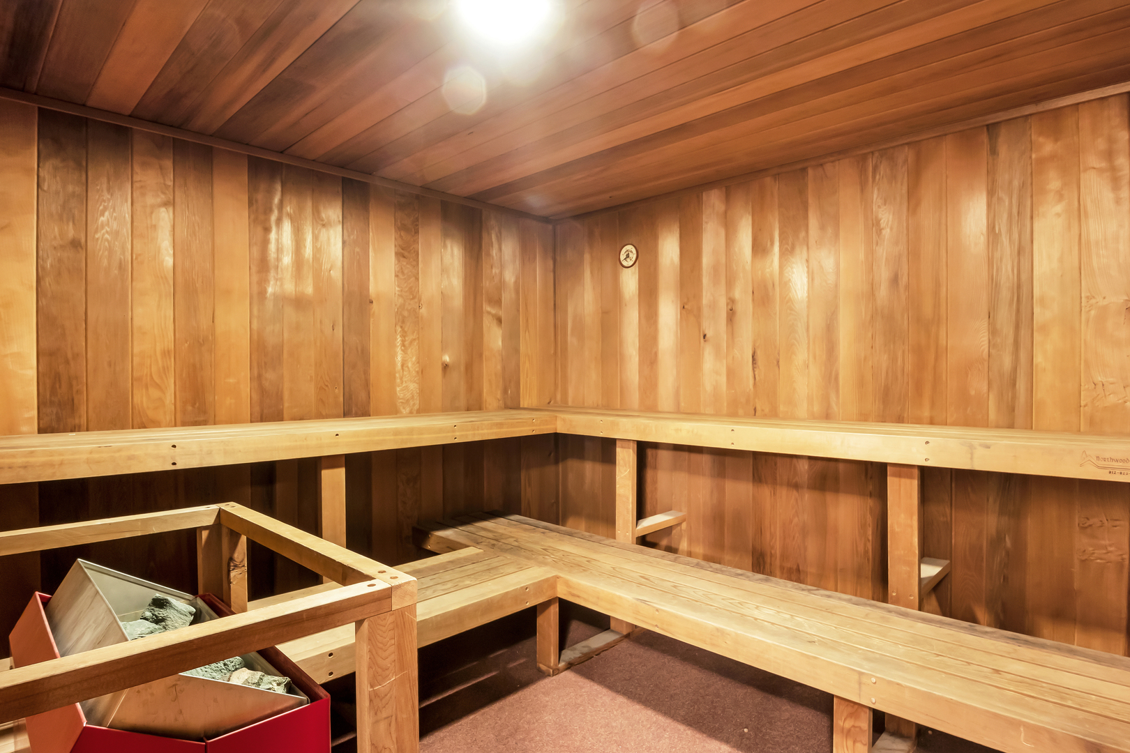 9560 Gross Point Road, Unit 509B Skokie, IL 60076 - Photo 35 of 41 a kitchen with a window a sink and a wooden cabinets