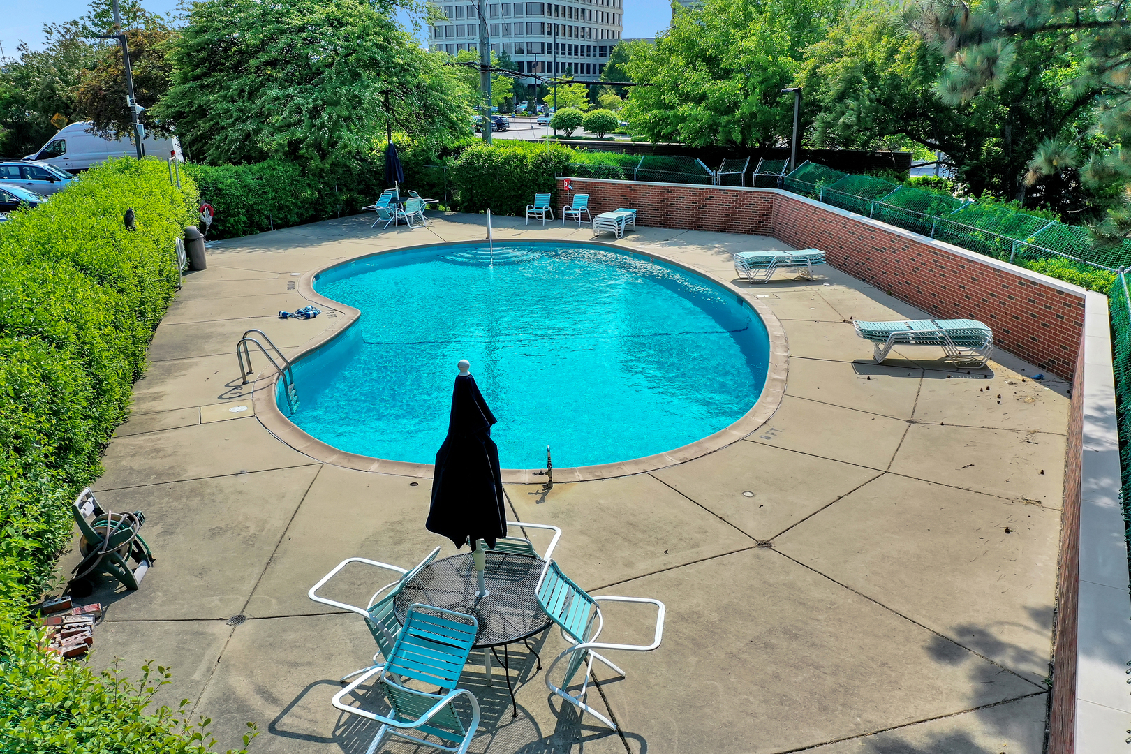 9560 Gross Point Road, Unit 509B Skokie, IL 60076 - Photo 36 of 41 a view of outdoor space and swimming pool