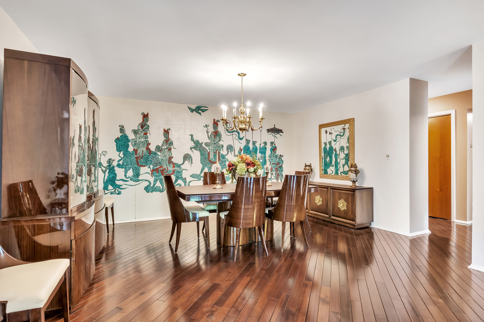 9560 Gross Point Road, Unit 509B Skokie, IL 60076 - Photo 6 of 41 a dining room with furniture a chandelier and wooden floor