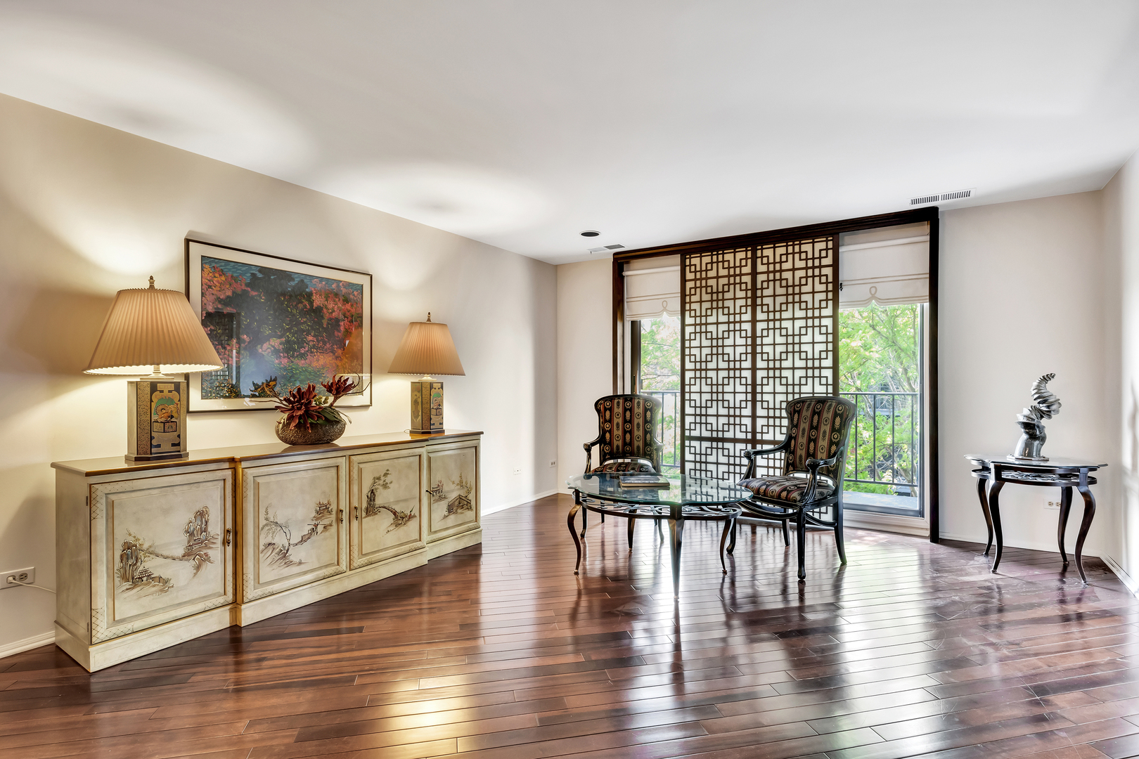 9560 Gross Point Road, Unit 509B Skokie, IL 60076 - Photo 7 of 41 a living room with furniture and wooden floor