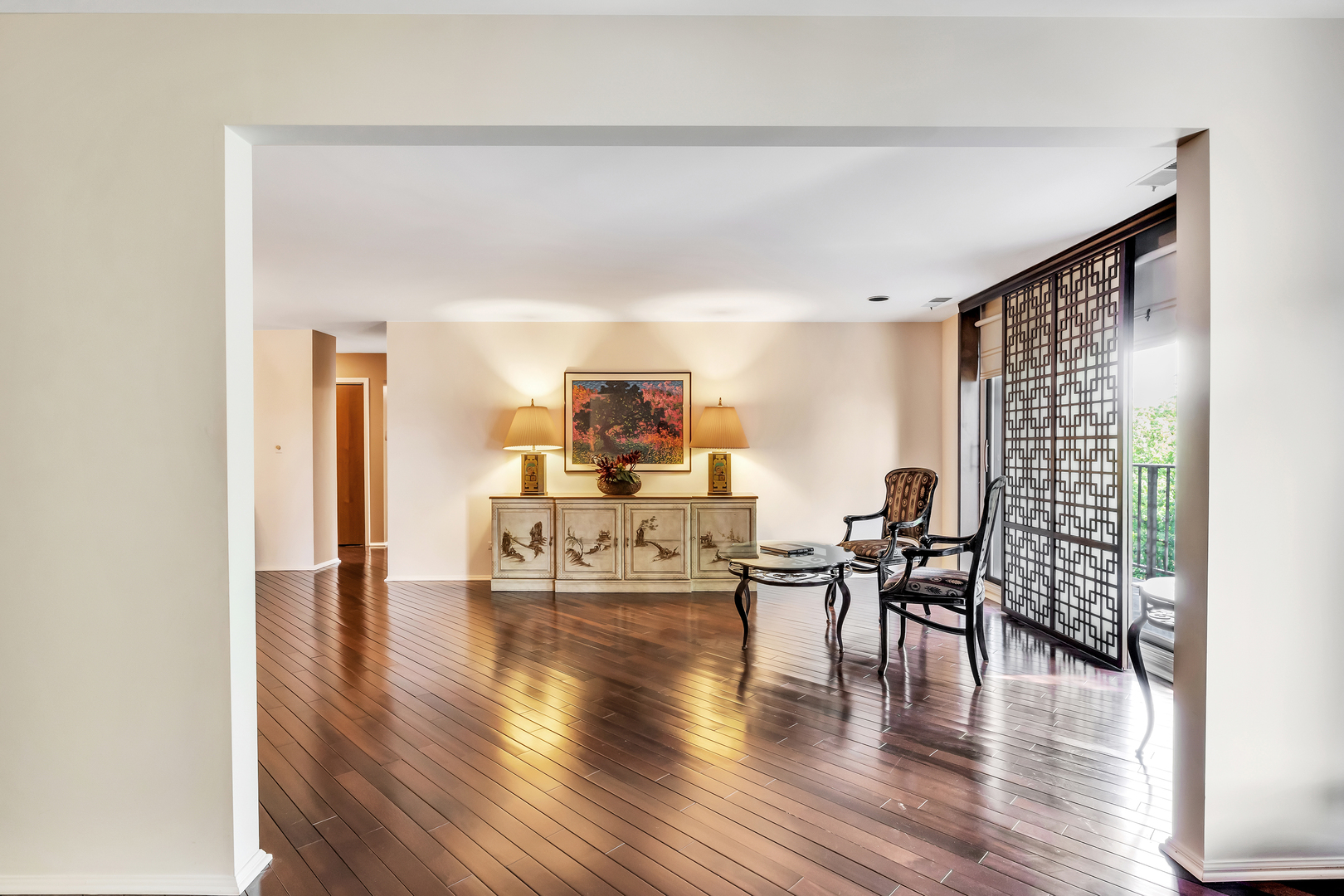 9560 Gross Point Road, Unit 509B Skokie, IL 60076 - Photo 8 of 41 a living room with furniture and wooden floor