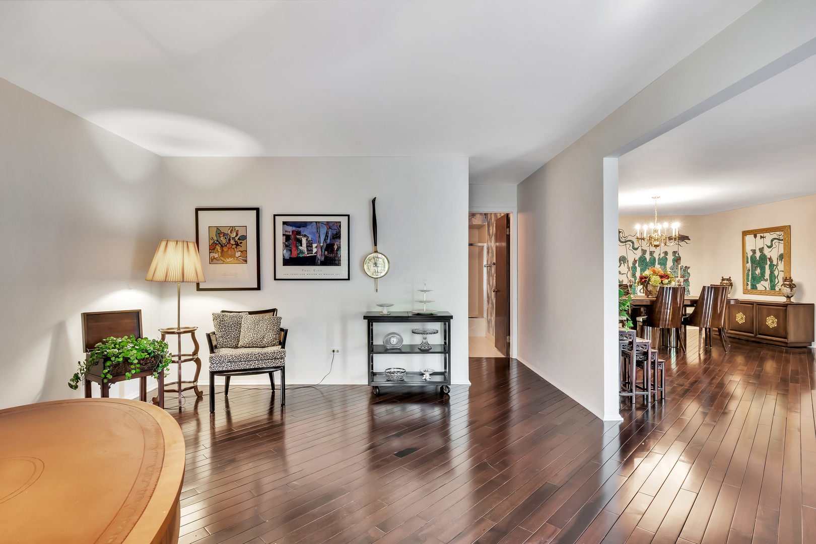 9560 Gross Point Road, Unit 509B Skokie, IL 60076 - Photo 10 of 41 a view of a livingroom with furniture and wooden floor