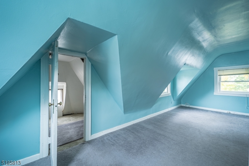 180 Bellevue Avenue Montclair, NJ 07043 - Photo 11 of 13 an empty room with windows