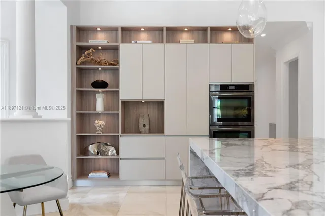 a kitchen with a cabinets and appliances