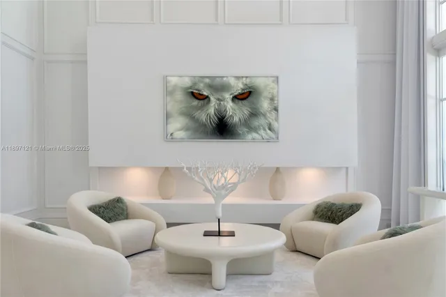 a living room with furniture and a lamp