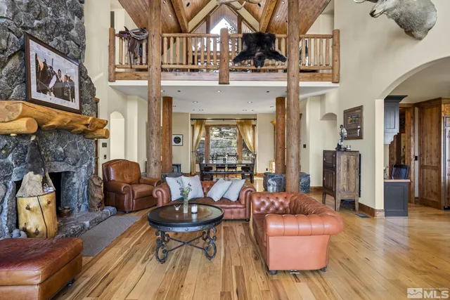 a living room with furniture and windows