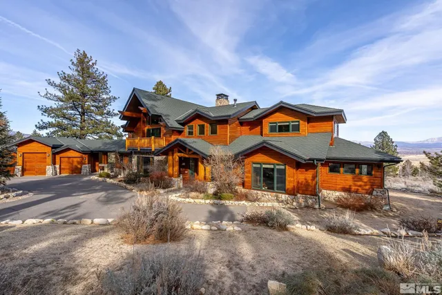 a view of a street with a building in the background