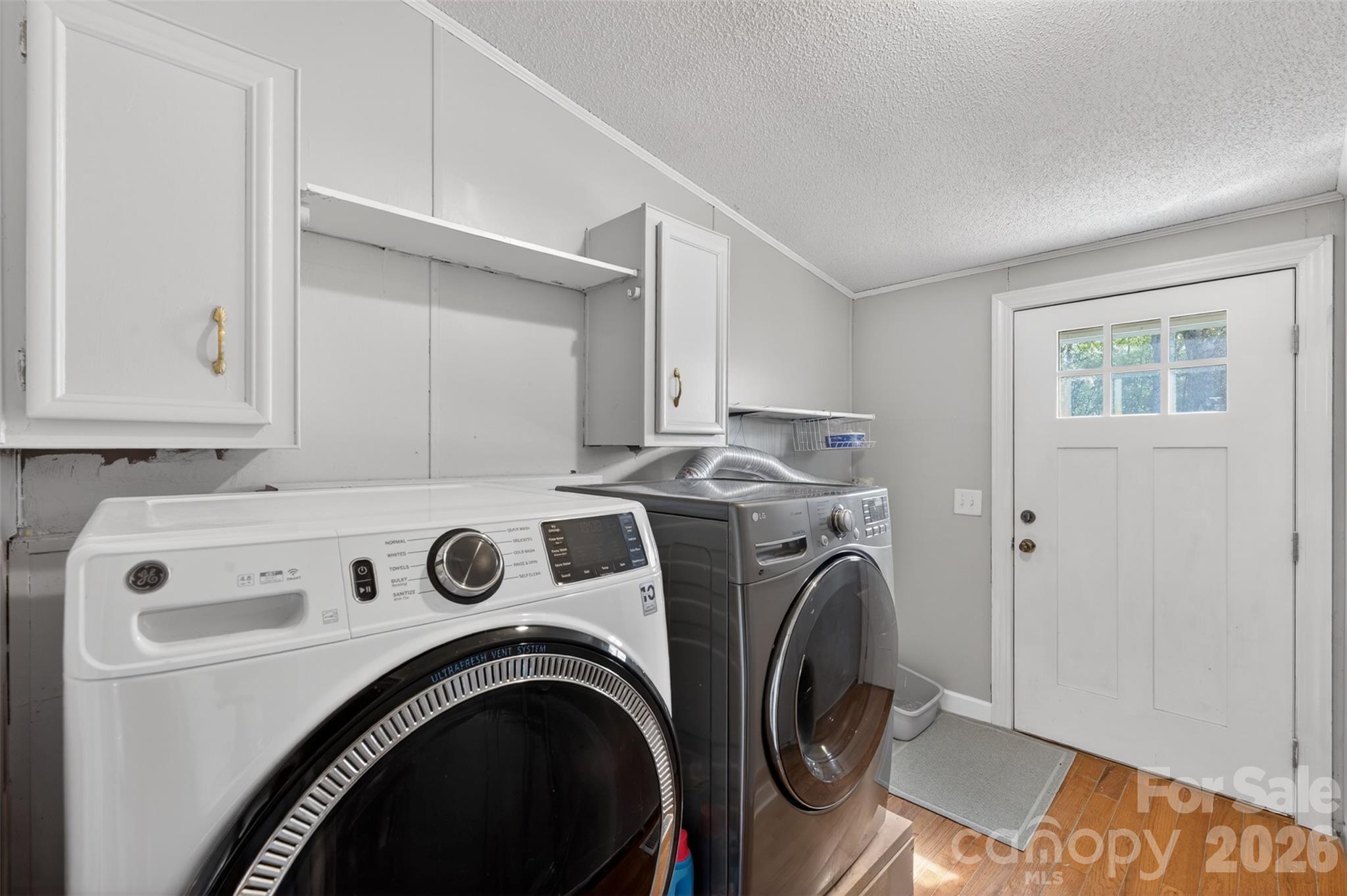4352 Anderson Mountain Road Maiden, NC 28650 - Photo 32 of 42 a utility room with dryer and washer