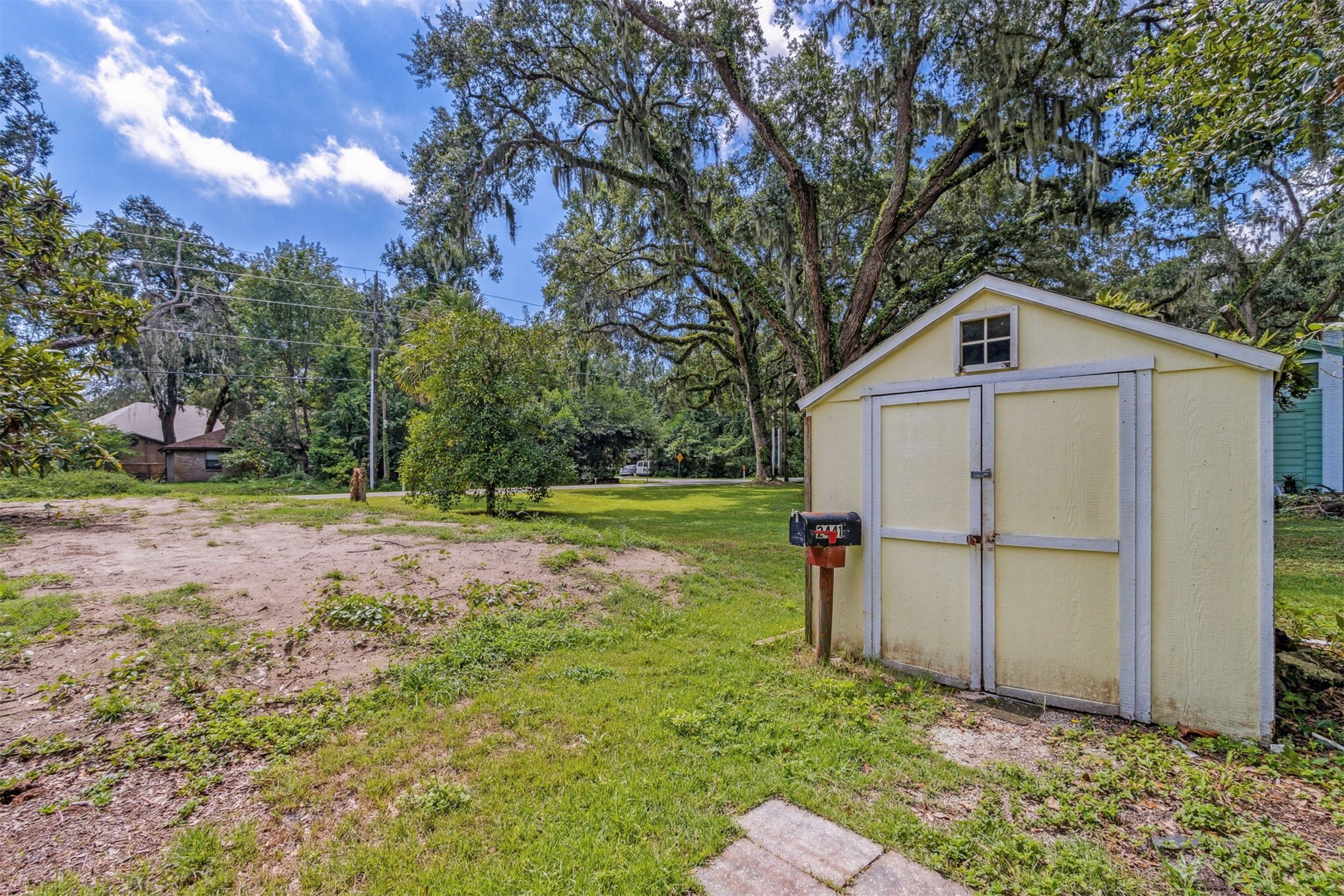 2441 Amelia Road Fernandina Beach, FL 32034 - Photo 36 of 36 a front view of a house with a yard