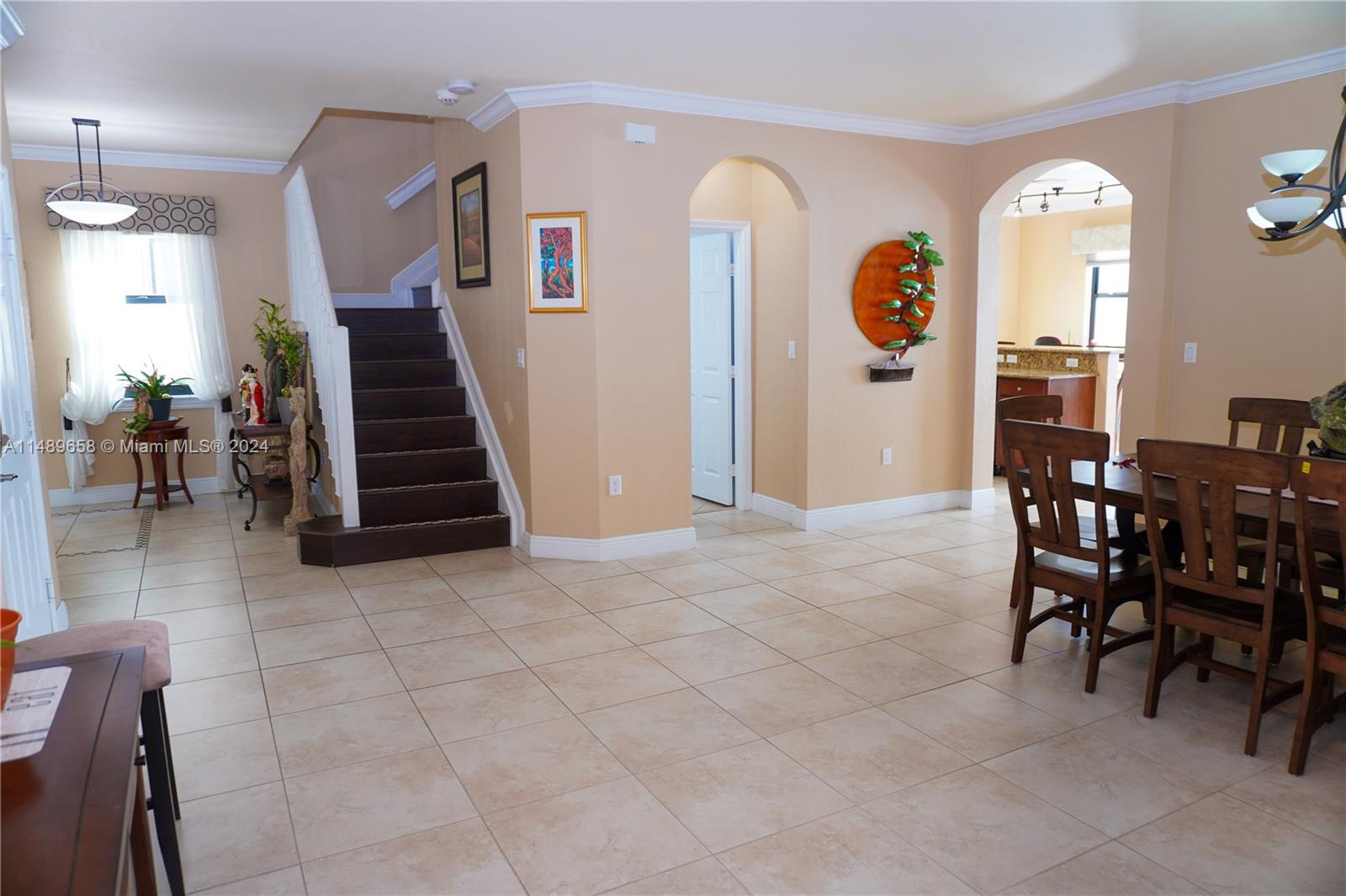 3522 West 88th Street Hialeah, FL 33018 - Photo 12 of 52 a view of a livingroom with furniture and entryway