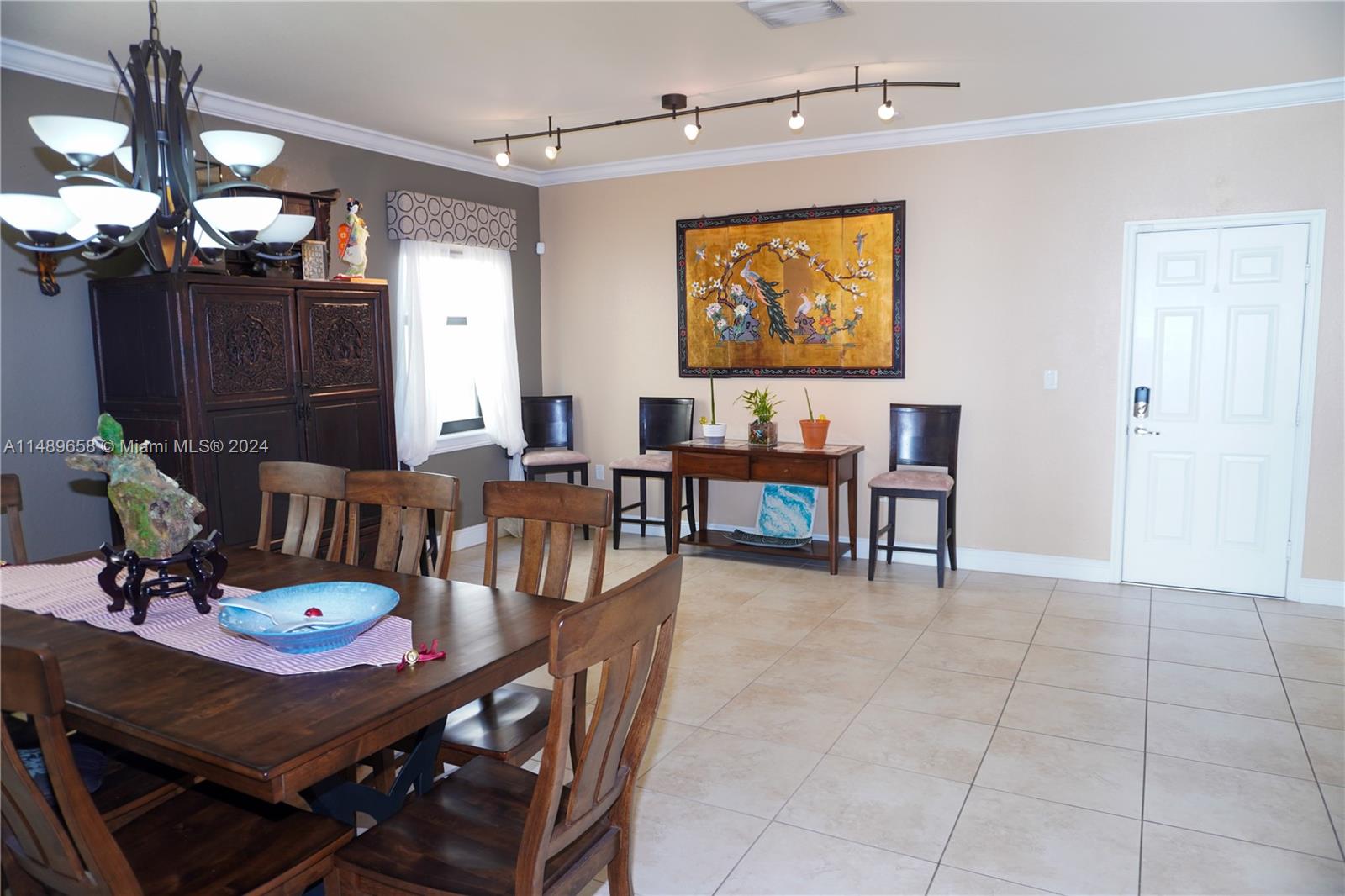 3522 West 88th Street Hialeah, FL 33018 - Photo 13 of 52 a view of a dining room with furniture