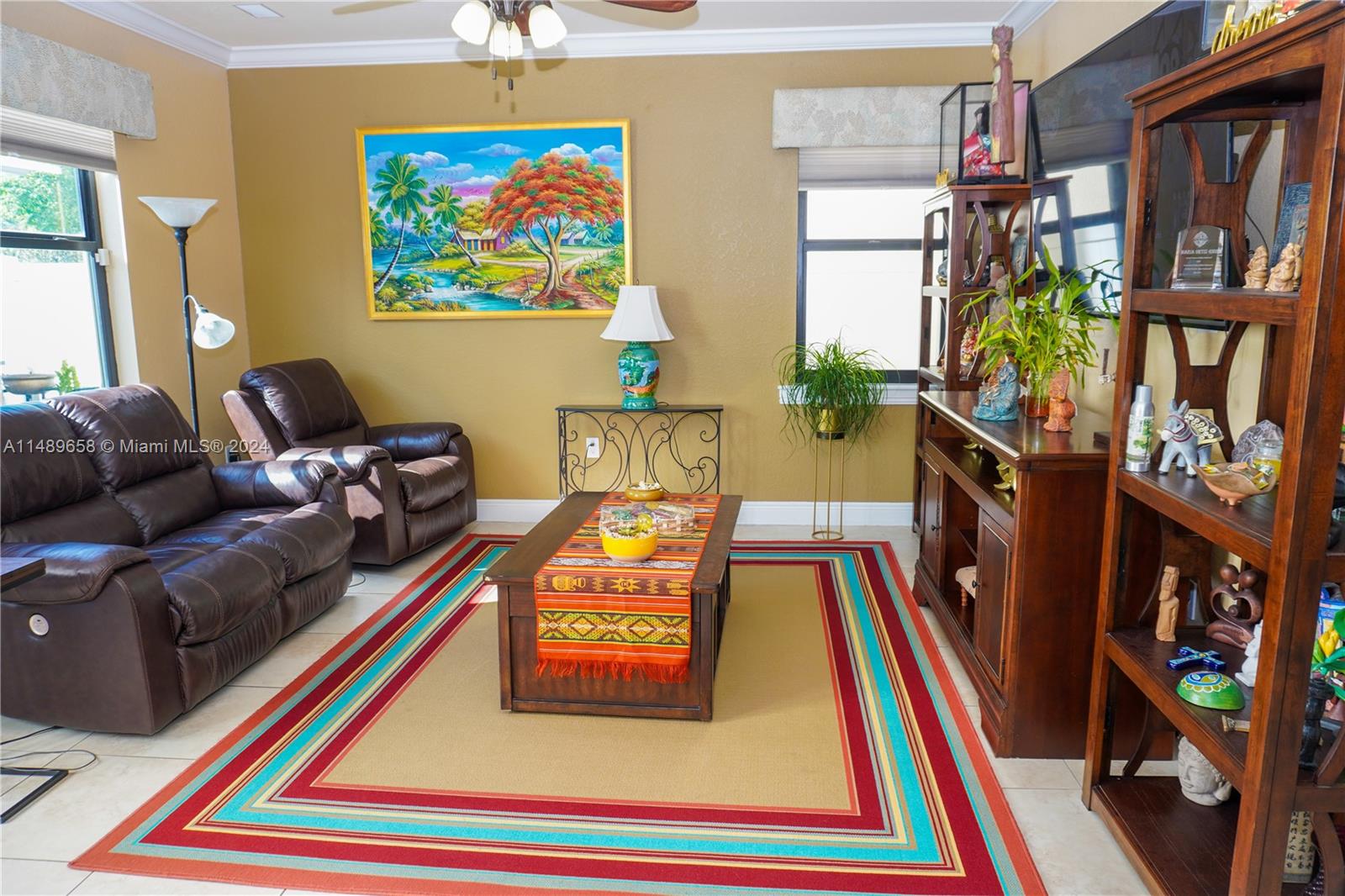 3522 West 88th Street Hialeah, FL 33018 - Photo 19 of 52 a living room with furniture and a rug