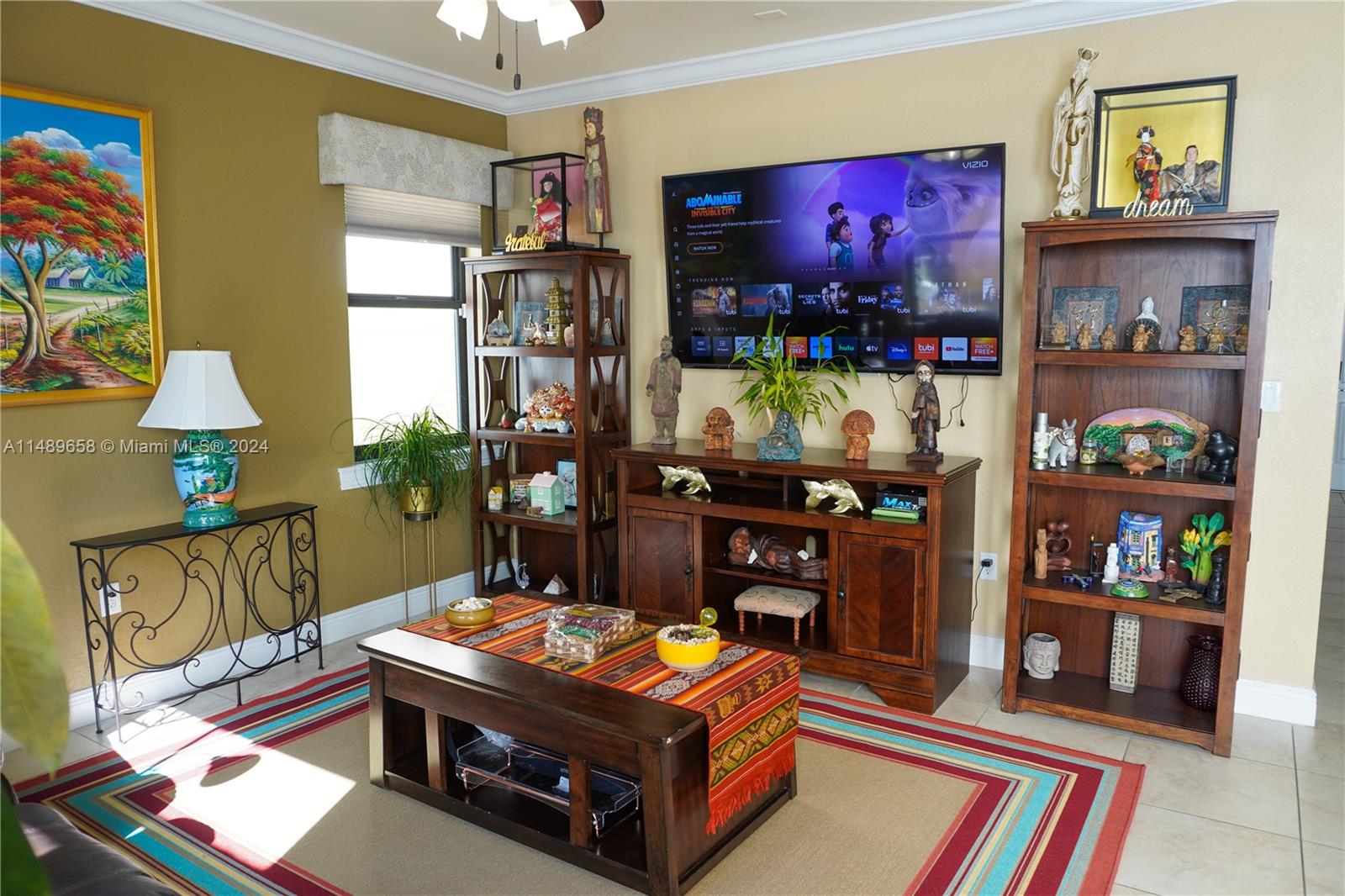 3522 West 88th Street Hialeah, FL 33018 - Photo 20 of 52 a living room with furniture and a flat screen tv