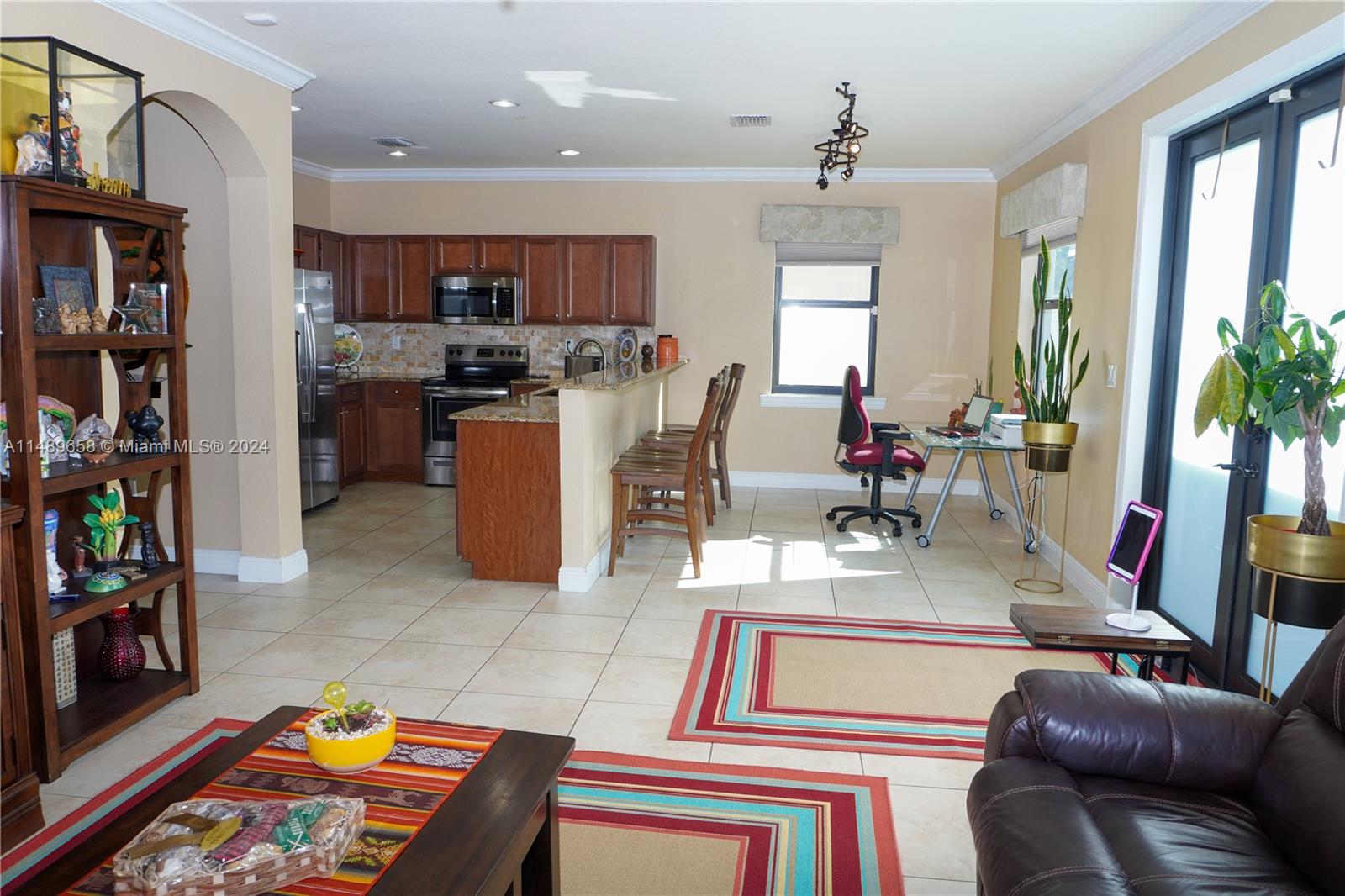 3522 West 88th Street Hialeah, FL 33018 - Photo 21 of 52 a living room with furniture and a window