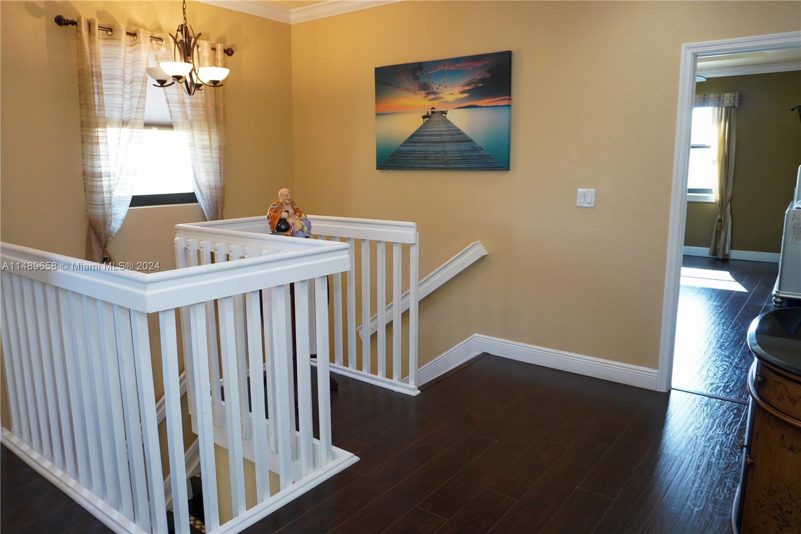 3522 West 88th Street Hialeah, FL 33018 - Photo 28 of 52 a view of a hallway with windows