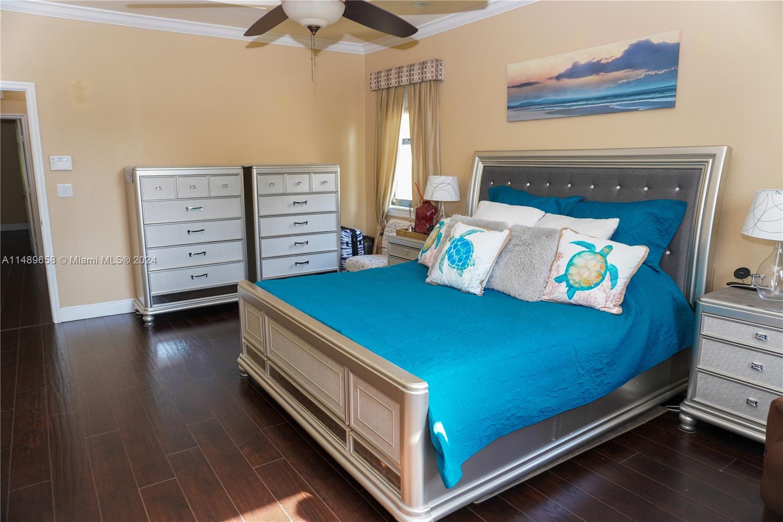 3522 West 88th Street Hialeah, FL 33018 - Photo 30 of 52 a bedroom with a bed and a tv
