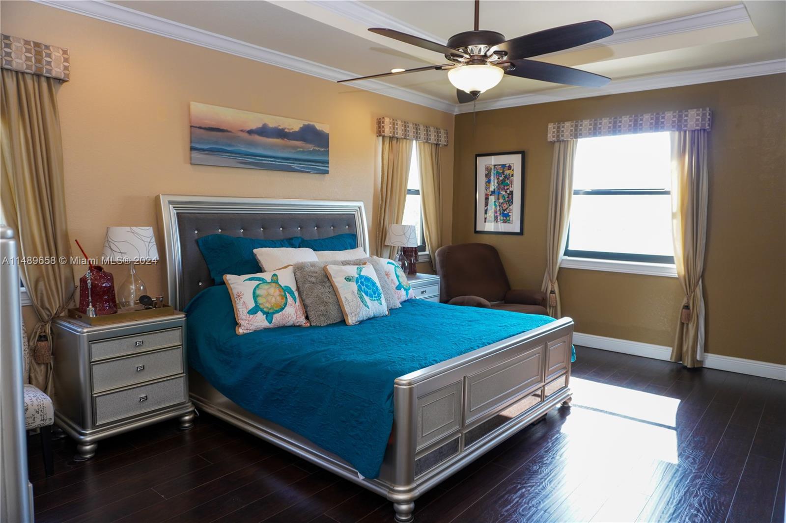 3522 West 88th Street Hialeah, FL 33018 - Photo 38 of 52 a bed room with a bed and a chandelier