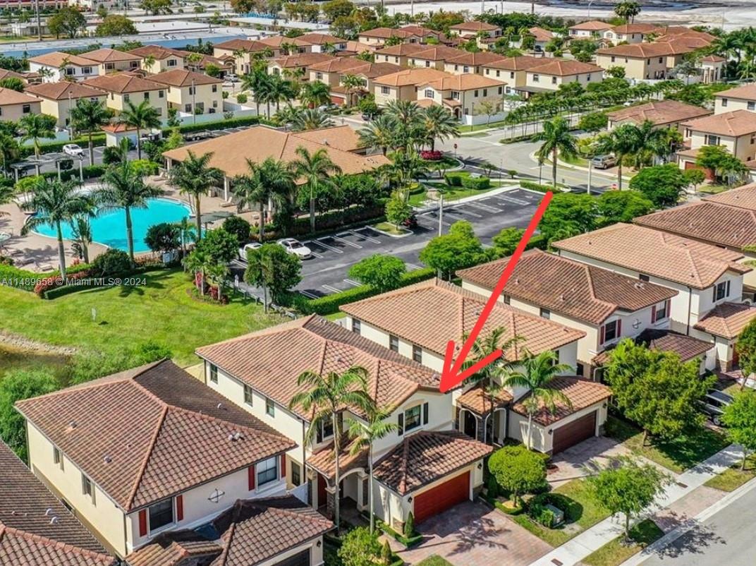 3522 West 88th Street Hialeah, FL 33018 - Photo 49 of 52 an aerial view of a house with a garden