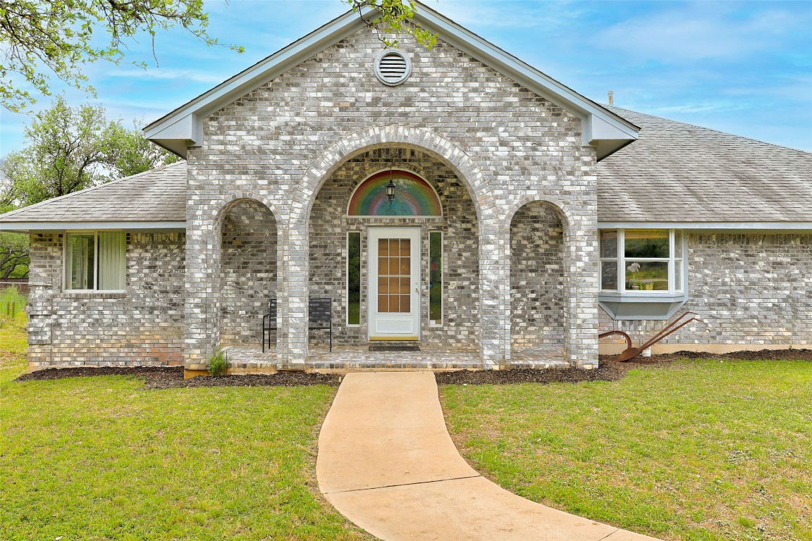 a view of swimming pool with a outdoor seating
