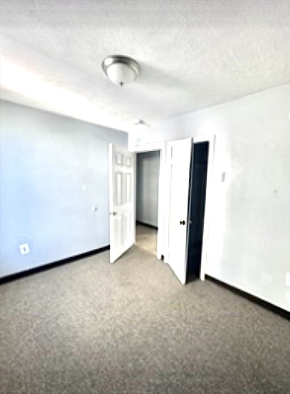 57 Rogers Avenue, Unit 2 Lynn, MA 01902 - Photo 8 of 9 a view of an empty room