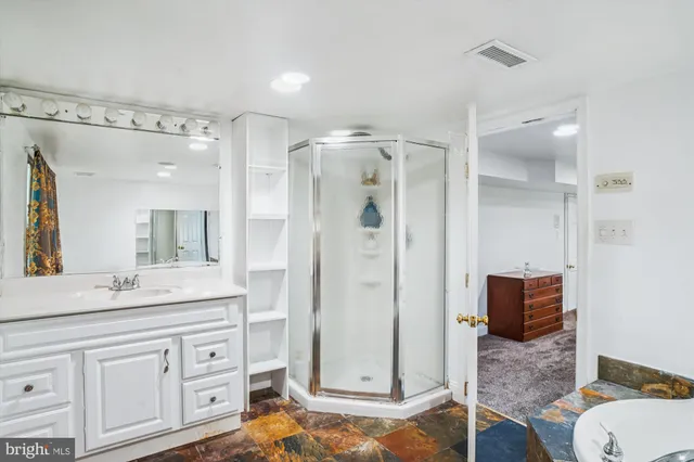 a bath tub sitting in a bathroom