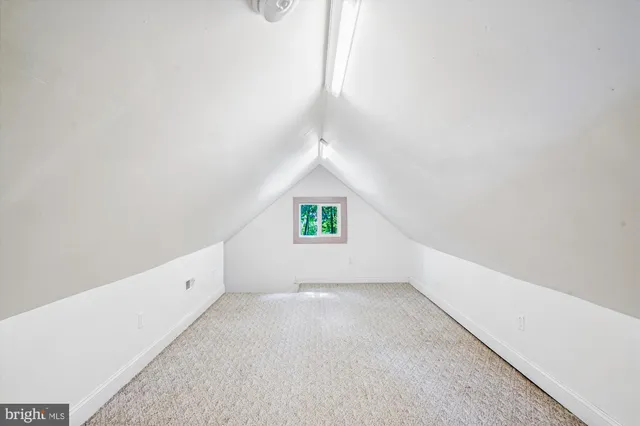 a view of a hallway view with staircase