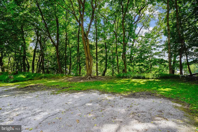 a view of a two chairs in the balcony