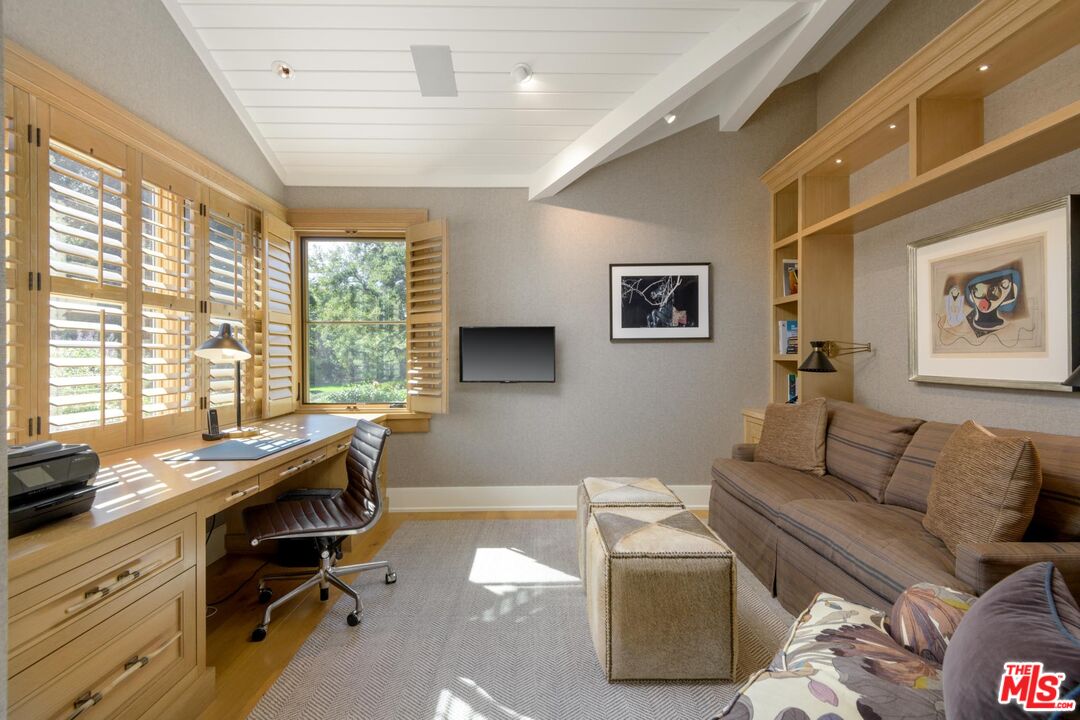 1779 Glen Oaks Drive Montecito, CA 93108 - Photo 17 of 32 a livingroom with workspace couch and a window