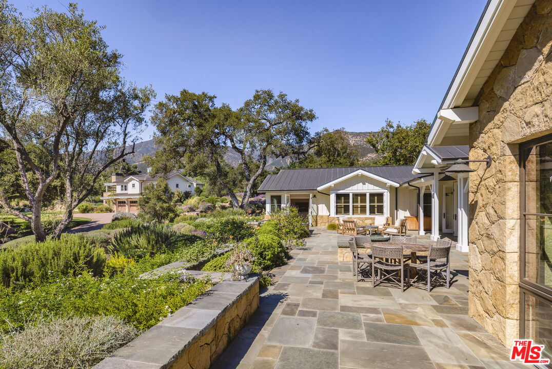 1779 Glen Oaks Drive Montecito, CA 93108 - Photo 20 of 32 a view of a house with sitting area and garden