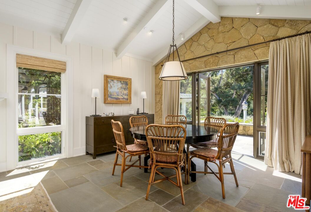 1779 Glen Oaks Drive Montecito, CA 93108 - Photo 9 of 32 a view of a dining room with furniture window and outside view