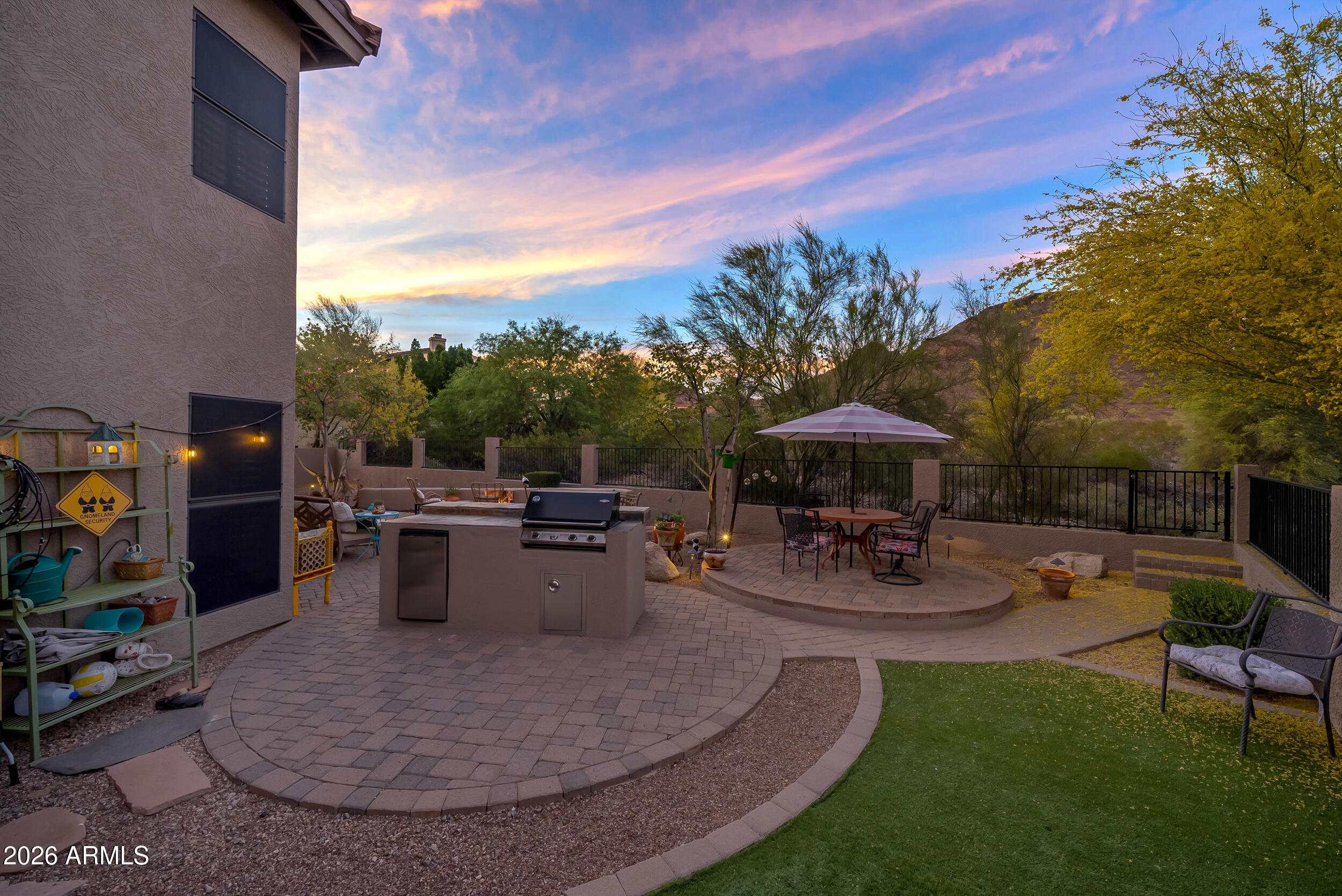 1539 East Winged Foot Road Phoenix, AZ 85022 - Photo 8 of 64 a view of a backyard with sitting area