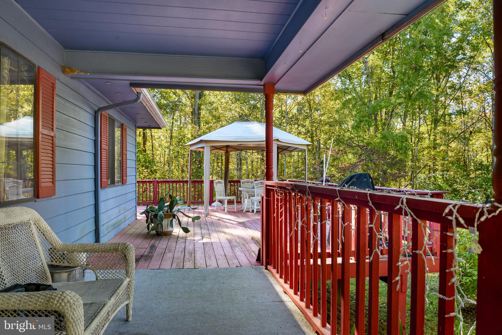 13079 Sillamon Road Goldvein, VA 22720 - Photo 11 of 13 Huge wrap around porch / deck