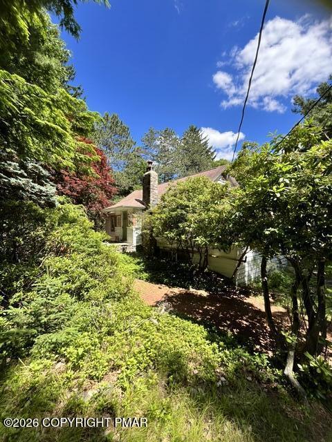 101 Knob Road Mount Pocono, PA 18344 - Photo 2 of 18 a backyard of a house with lots of green space