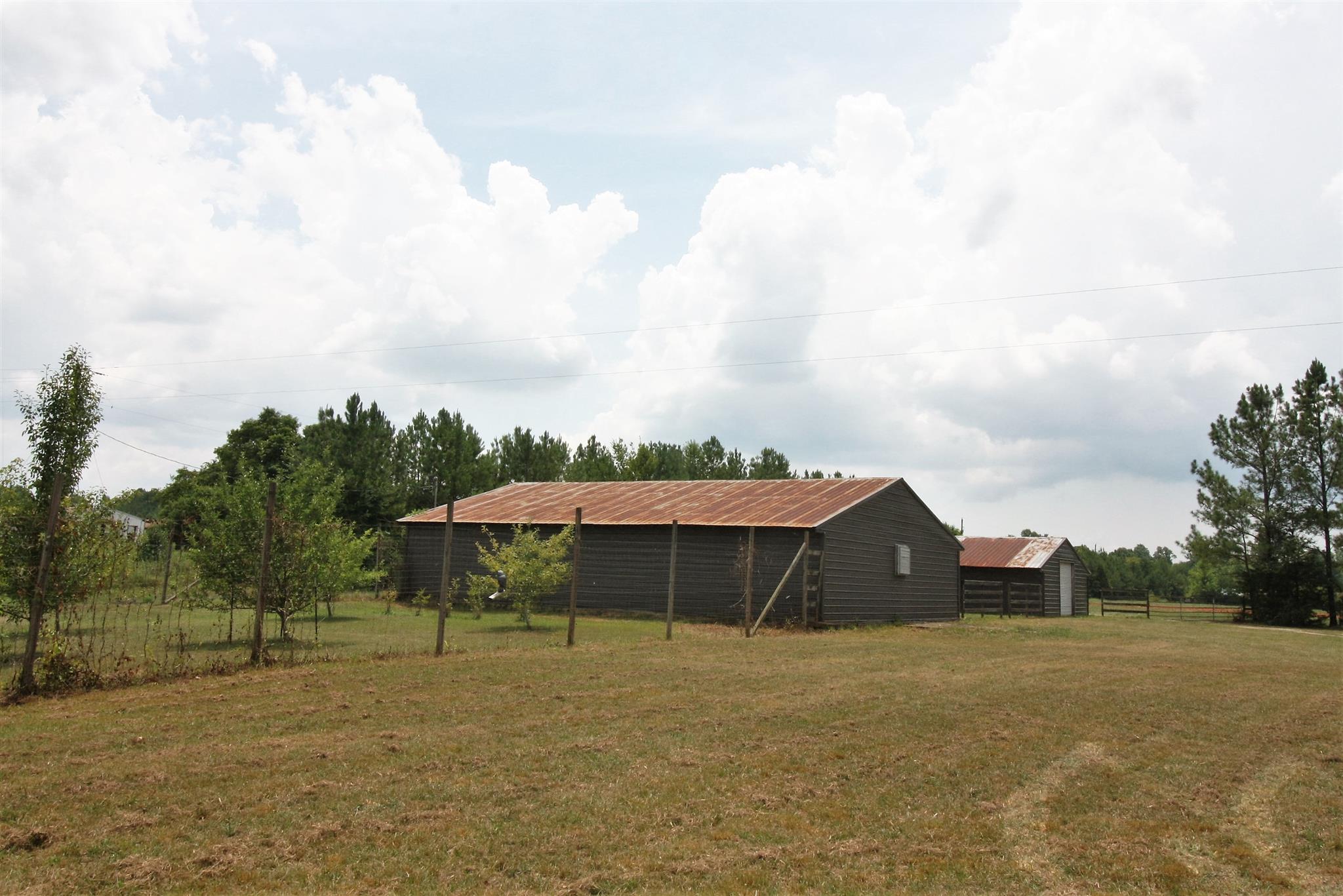17550 Witty Mill Road Elkmont, AL 35620 - Photo 18 of 27 a view of a house with a yard and sitting area