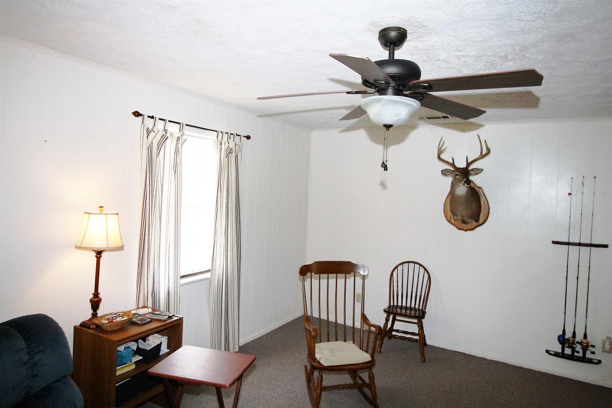 17550 Witty Mill Road Elkmont, AL 35620 - Photo 4 of 27 a view of a room with gym equipment