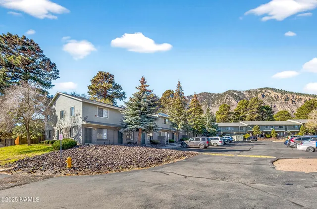 a view of street along with trees
