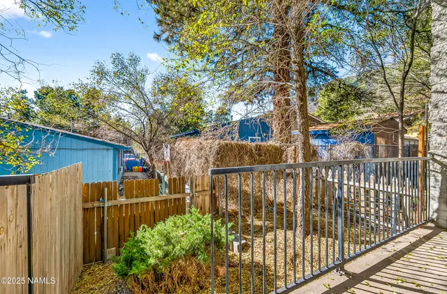 a view of street from balcony