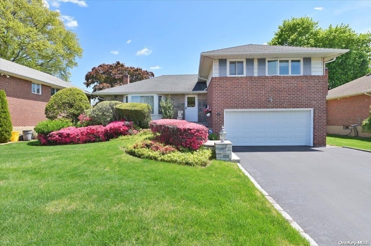 15 Clearland Road Syosset, NY 11791 - Photo 1 of 1 Clearview Village-Brick and Fieldstone Entry