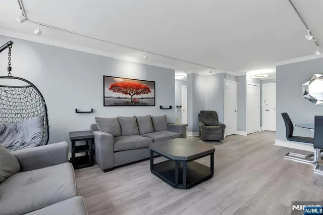 a living room with furniture a rug and a couch