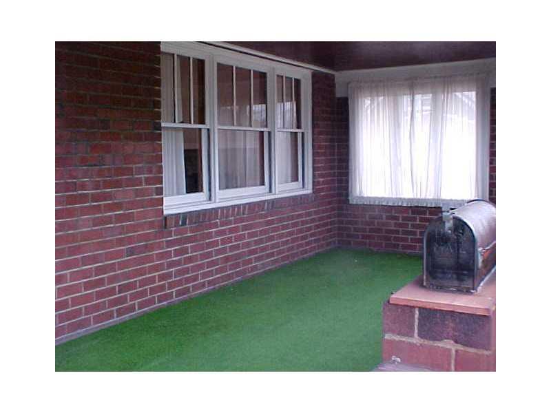 1150 Ridge Road Ambridge, PA 15003 - Photo 4 of 13 Exterior Front. Large front porch to relax on.