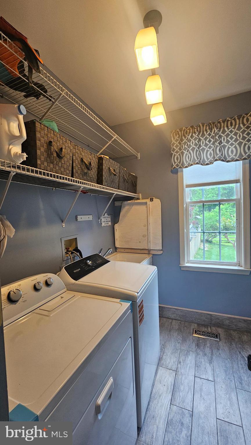 6107 Traceys Overlook Road Tracys Landing, MD 20779 - Photo 17 of 67 a utility room with dryer and washer