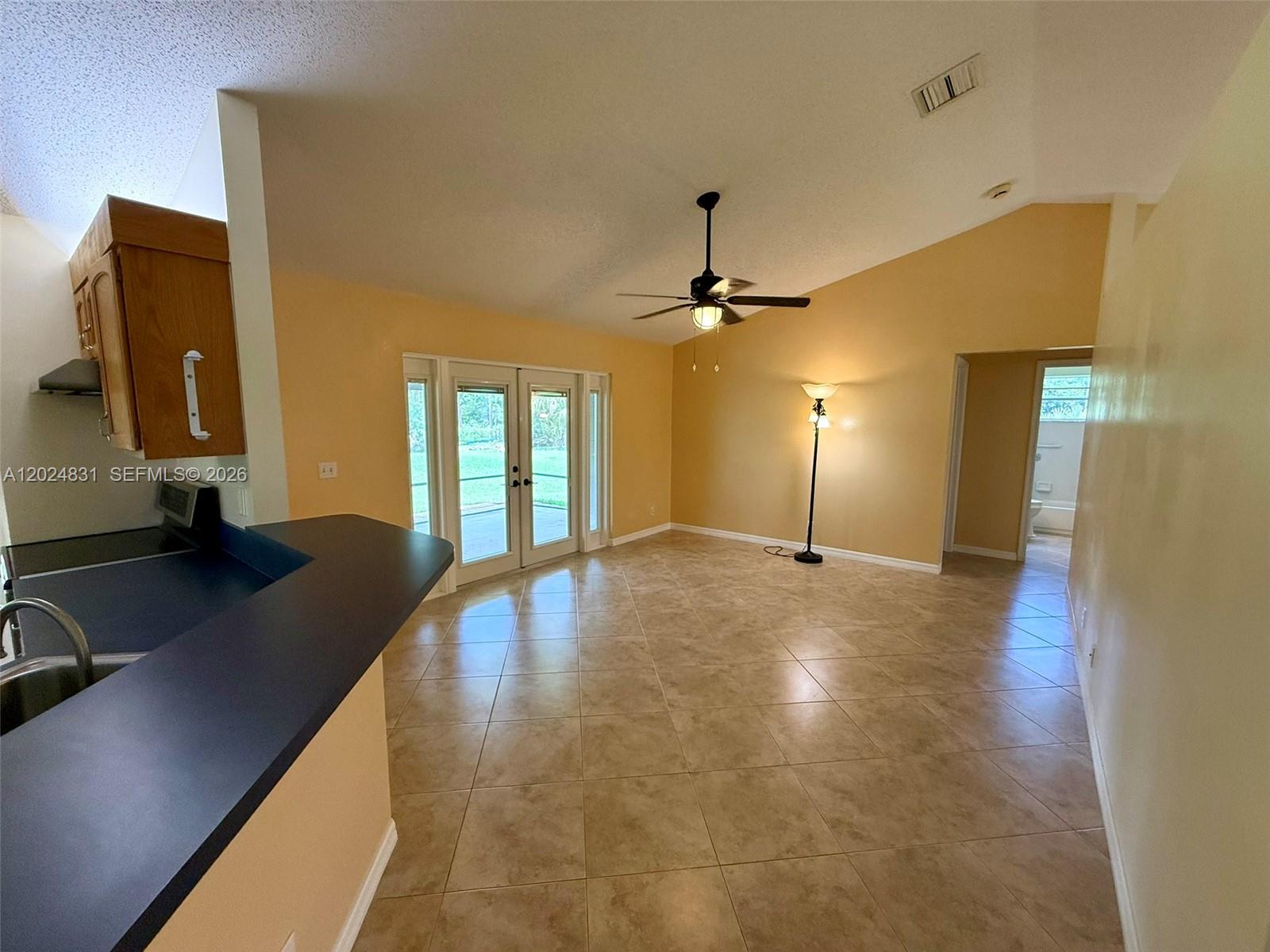 15819 76th Road North Loxahatchee, FL 33470 - Photo 14 of 45 a view of a livingroom with a staircase