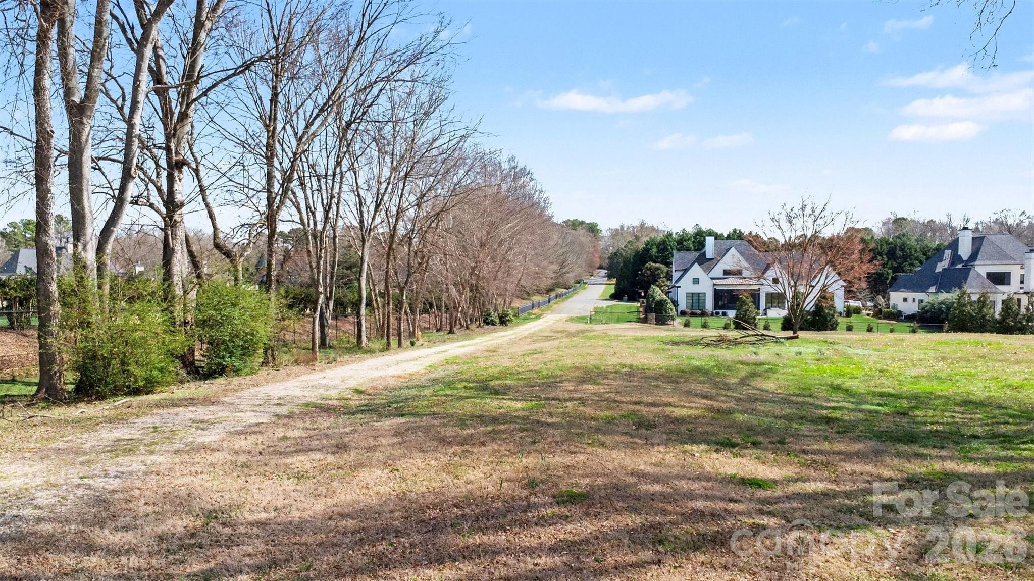 433 Weddington Church Road Waxhaw, NC 28173 - Photo 12 of 16 a view of a town with large trees