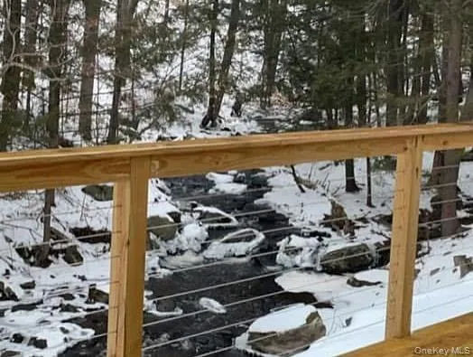 a view of a lake with a house