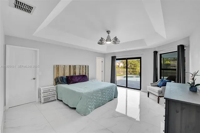 a bathroom with a bathtub and a sink