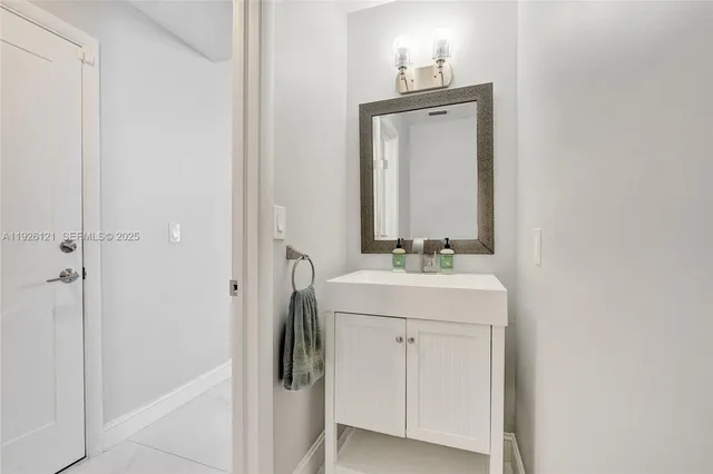 a view of a house with backyard porch and sitting area