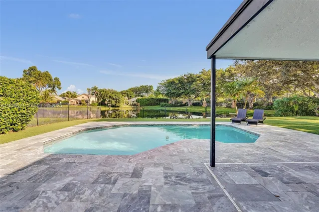 $948,500 | 3071 Perriwinkle Circle, Davie, FL 33328