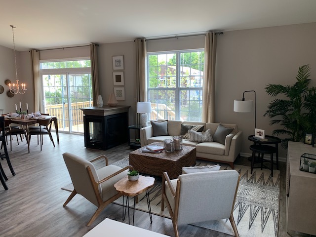 489 Ridge Road Bolingbrook, IL 60440 - Photo 12 of 34 a living room with furniture and a wooden floor