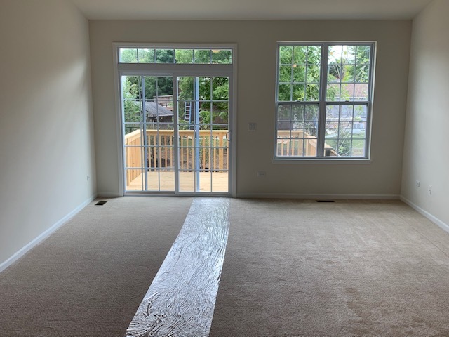 489 Ridge Road Bolingbrook, IL 60440 - Photo 25 of 34 an empty room with windows